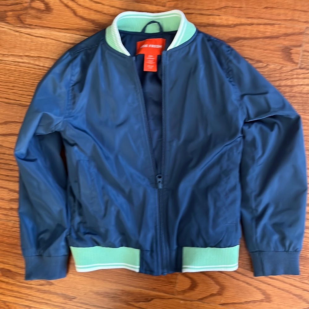 Blue light weight lined mint trimmed jacket. Perfect for spring or fall.